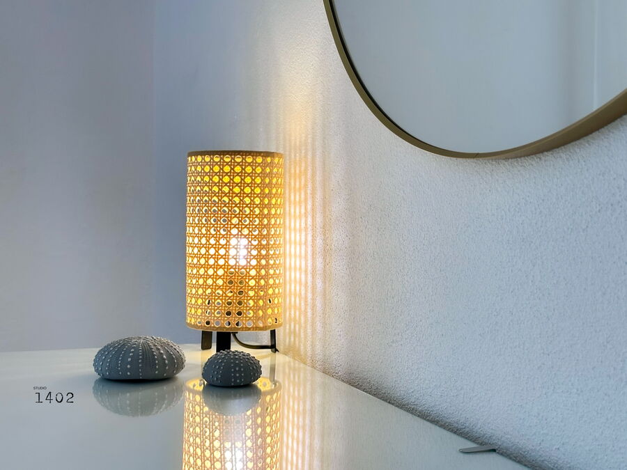 Bedside lamp and mirror in the bedroom